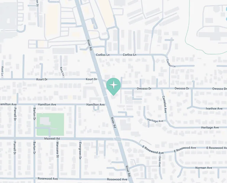 Map showing a neighborhood area with River Road running vertically and nearby streets including Hamilton Avenue and Kourt Drive. A location marker highlights a spot along River Road near the intersection with Hamilton Avenue.