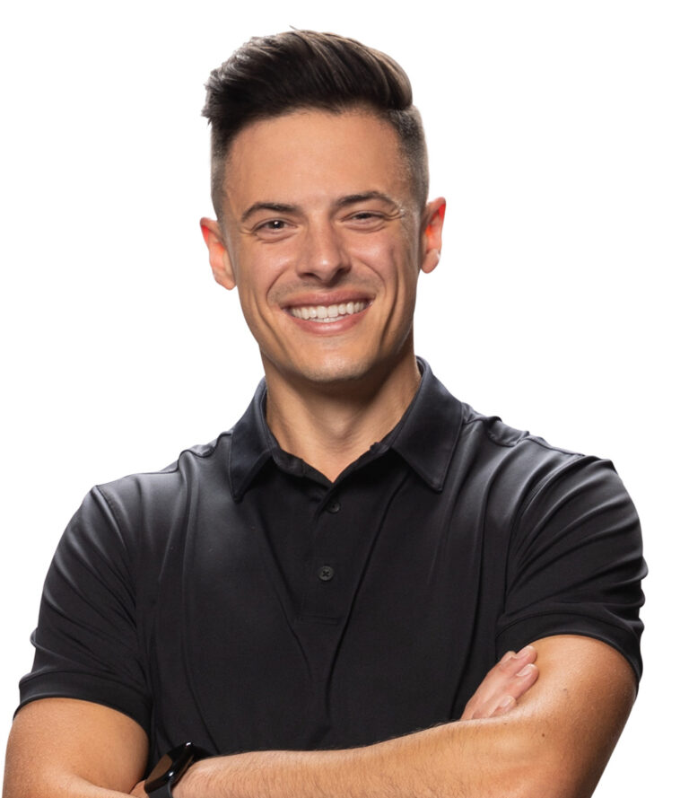 A man in a black shirt smiles with his arms crossed against a light background. He looks directly at the camera, conveying confidence and friendliness.